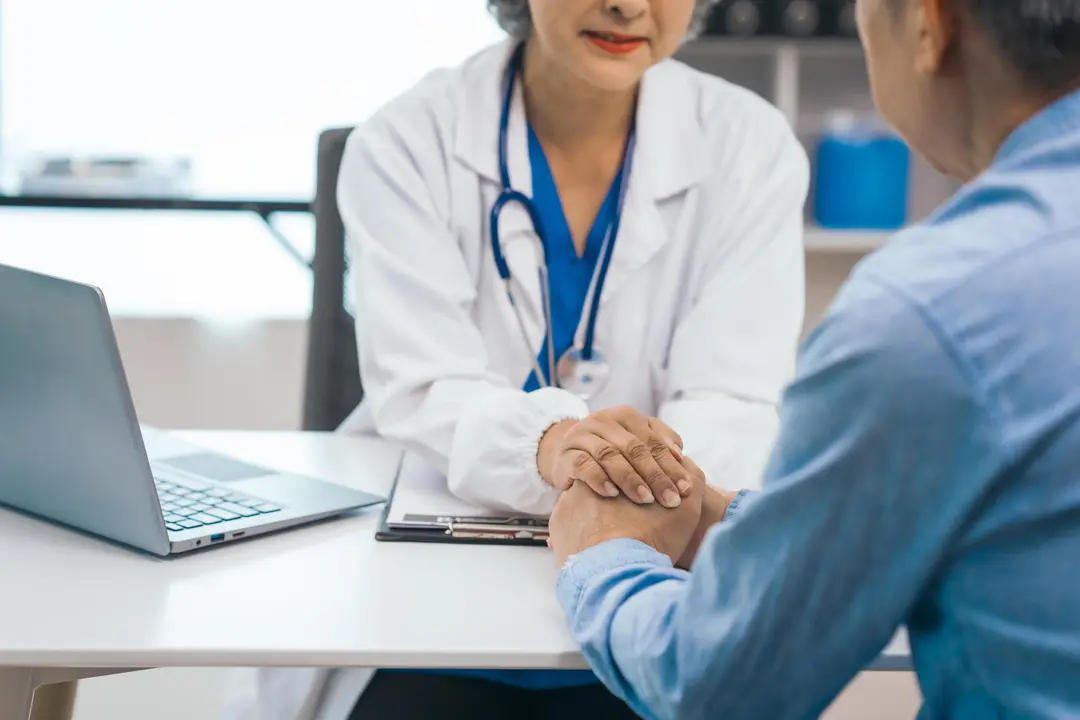 Elderly patient asian people attentively listening to mature doctor, receiving health advice