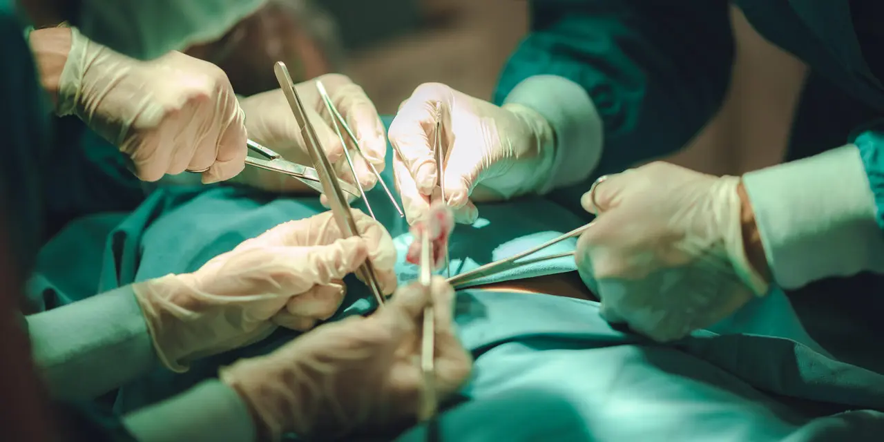 Anesthetist surgery doctor professional team are working in hospital operating room