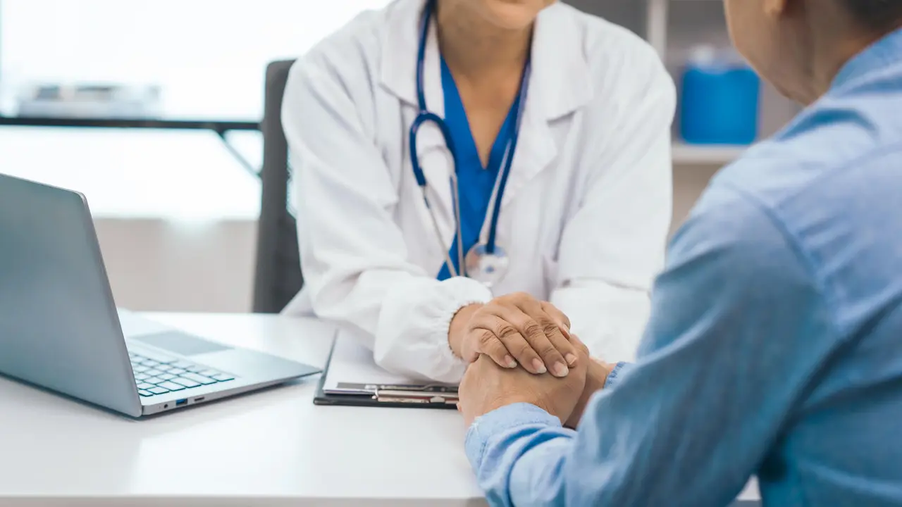 Elderly patient asian people attentively listening to mature doctor, receiving health advice