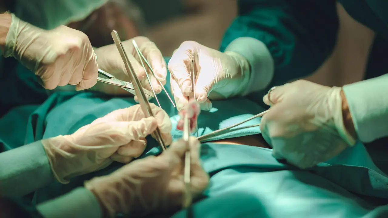 Anesthetist surgery doctor professional team are working in hospital operating room